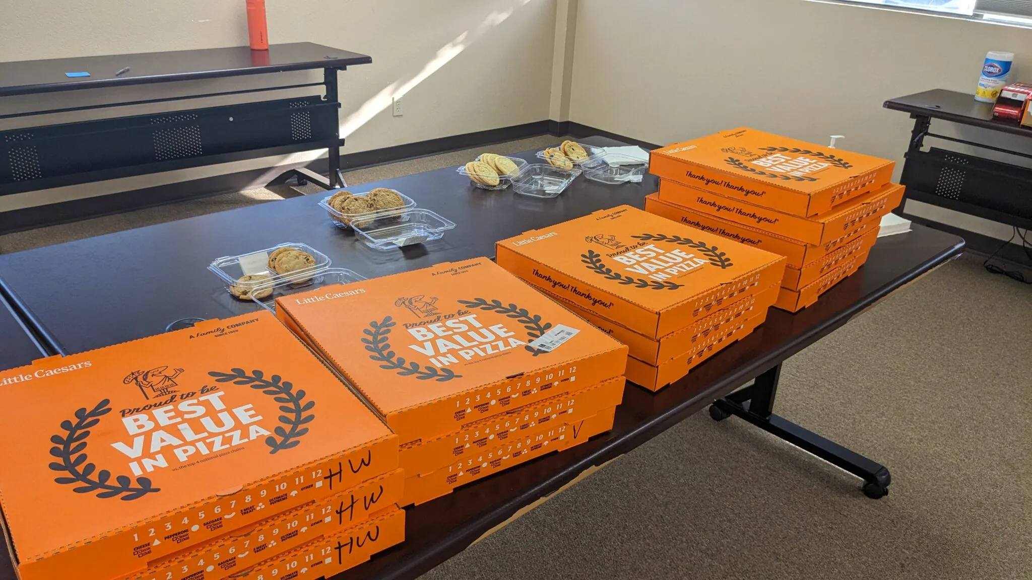 table with pizza boxes