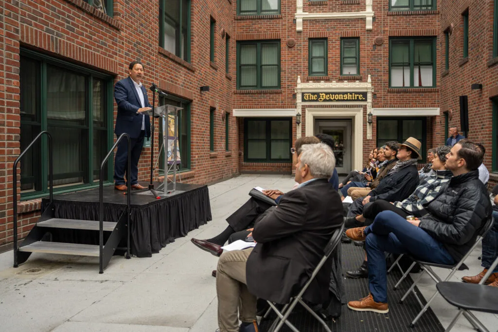 Mayor Bruce Harrell addressing the crowd at the Devonshire grand opening