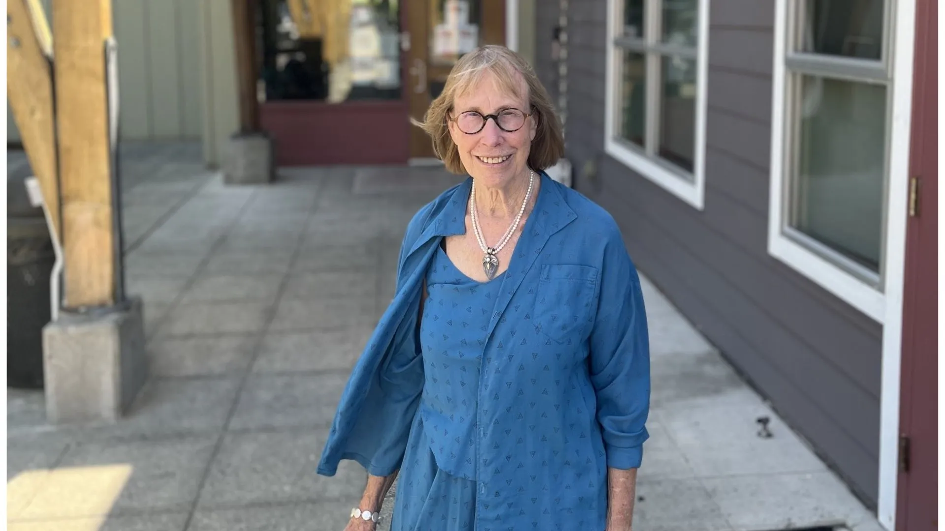 Teenagers and young adults stand in a group discussion